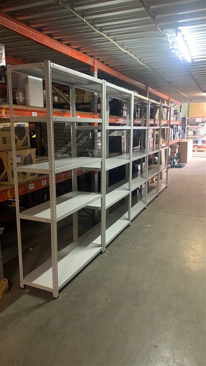 Металлический полочный стеллаж МС — надёжное хранение для склада и гаража Металлический полочный стеллаж МС — надёжное хранение для склада и гаража